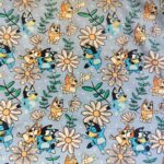 Tela punto Bluey margaritas. Ref 748