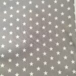 Tela algodón estrella fondo gris. Ref. 760