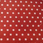 Tela algodón estrellas fondo teja. Ref 762