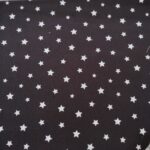 Tela algodón estrellas negra .Ref. 776