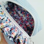 Cristina y Alejandra. Neceser volantes azul