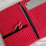 Cristina y Alejandra. Portafolios vichy rojo